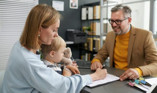 Woman filing documents for social benefits